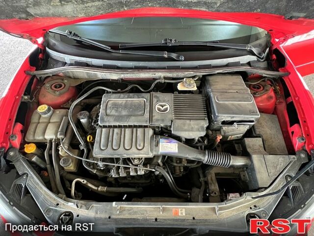 Красный Мазда 3, объемом двигателя 1.6 л и пробегом 190 тыс. км за 5900 $, фото 7 на Automoto.ua