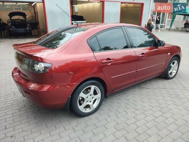 Красный Мазда 3, объемом двигателя 1.6 л и пробегом 238 тыс. км за 6300 $, фото 2 на Automoto.ua