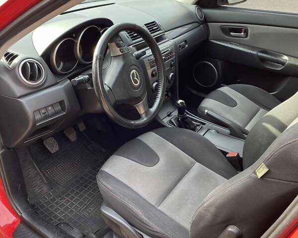 Красный Мазда 3, объемом двигателя 2 л и пробегом 160 тыс. км за 5300 $, фото 6 на Automoto.ua