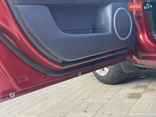 Красный Мазда 3, объемом двигателя 2 л и пробегом 244 тыс. км за 6800 $, фото 11 на Automoto.ua