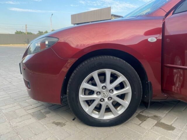 Красный Мазда 3, объемом двигателя 2 л и пробегом 220 тыс. км за 6700 $, фото 3 на Automoto.ua
