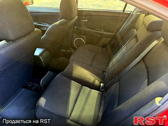 Красный Мазда 3, объемом двигателя 2 л и пробегом 200 тыс. км за 5400 $, фото 6 на Automoto.ua