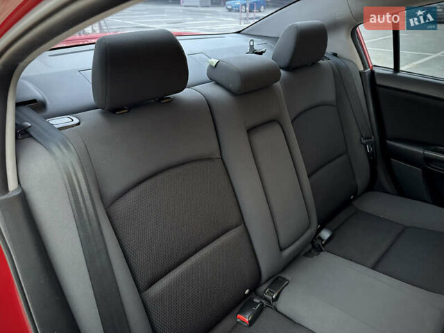 Красный Мазда 3, объемом двигателя 2 л и пробегом 205 тыс. км за 5900 $, фото 48 на Automoto.ua