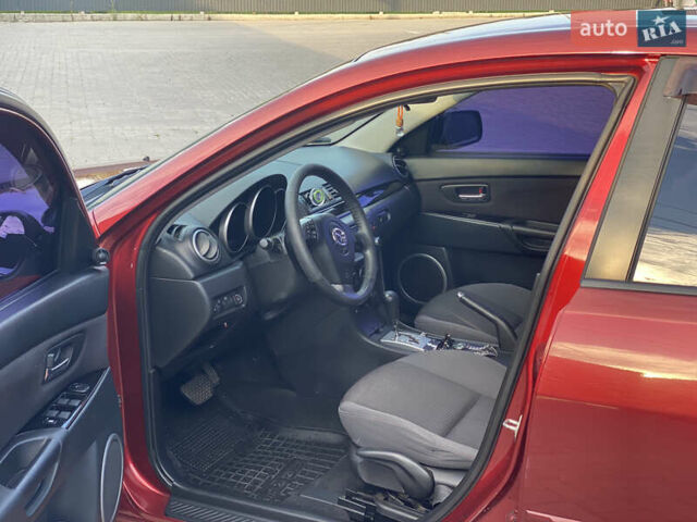 Красный Мазда 3, объемом двигателя 2 л и пробегом 244 тыс. км за 6800 $, фото 10 на Automoto.ua