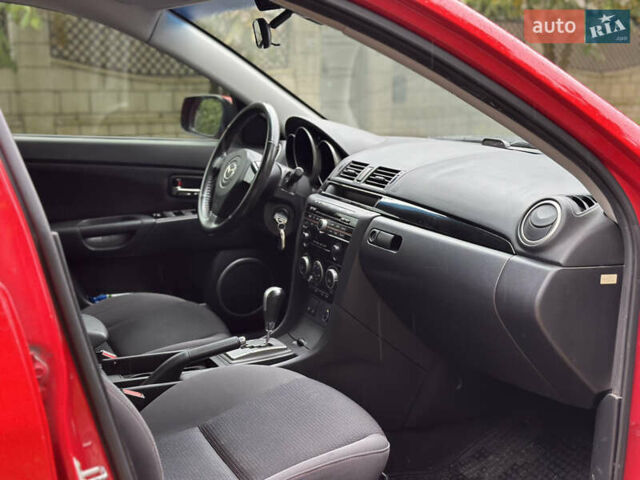 Мазда 3 2008 в Киеве на Automoto.ua Красный Мазда 3, объемом двигателя 1.6 л и пробегом 170 тыс. км за 6400 $, фото 34 на Automoto.ua