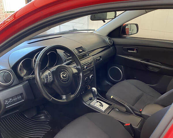 Красный Мазда 3, объемом двигателя 1.6 л и пробегом 309 тыс. км за 5200 $, фото 5 на Automoto.ua