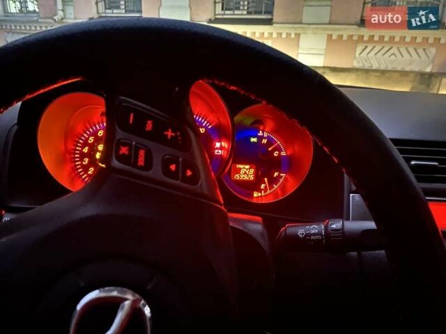 Красный Мазда 3, объемом двигателя 2 л и пробегом 160 тыс. км за 5300 $, фото 12 на Automoto.ua