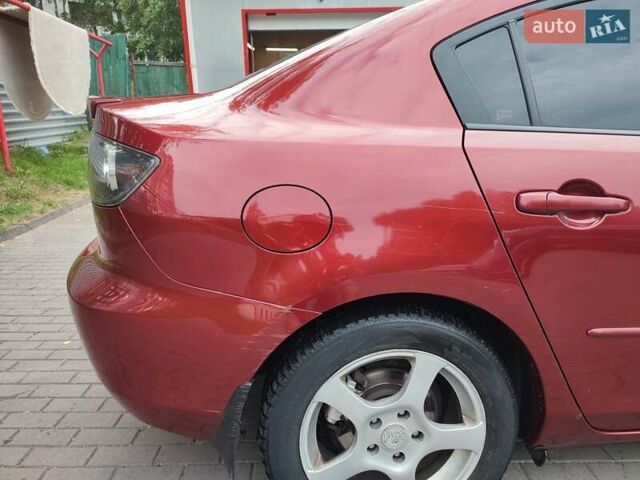 Красный Мазда 3, объемом двигателя 1.6 л и пробегом 238 тыс. км за 6300 $, фото 13 на Automoto.ua