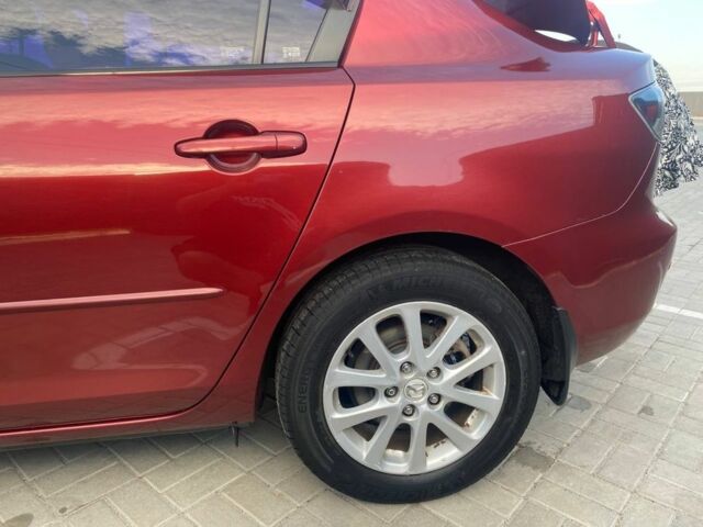 Красный Мазда 3, объемом двигателя 2 л и пробегом 220 тыс. км за 6700 $, фото 4 на Automoto.ua