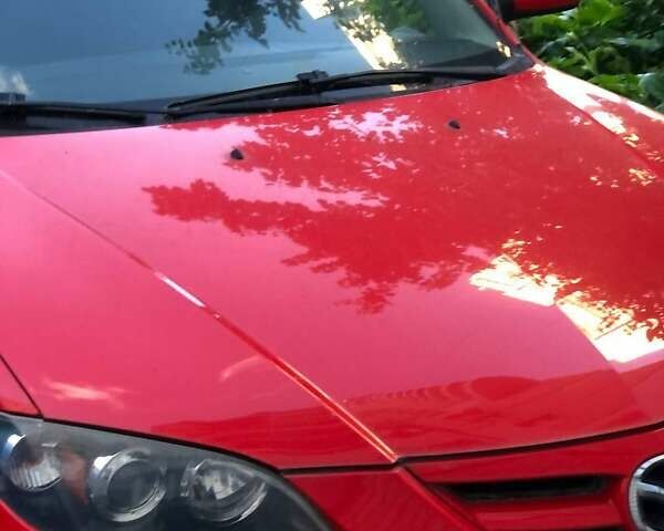 Красный Мазда 3, объемом двигателя 2 л и пробегом 42 тыс. км за 10000 $, фото 4 на Automoto.ua