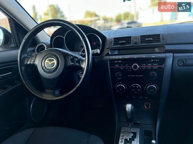Красный Мазда 3, объемом двигателя 2 л и пробегом 192 тыс. км за 5699 $, фото 13 на Automoto.ua