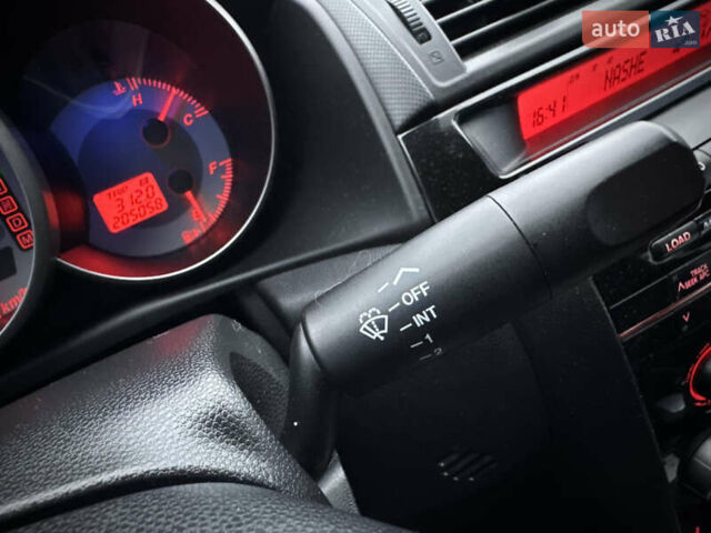 Красный Мазда 3, объемом двигателя 2 л и пробегом 205 тыс. км за 5400 $, фото 45 на Automoto.ua