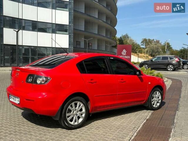 Красный Мазда 3, объемом двигателя 2 л и пробегом 240 тыс. км за 4700 $, фото 1 на Automoto.ua