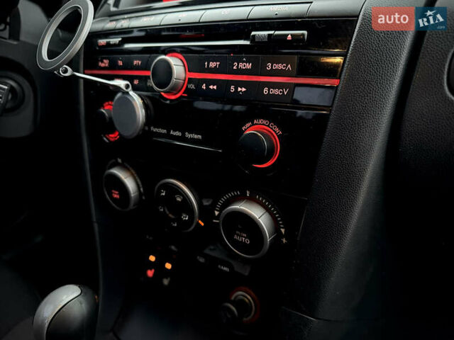 Красный Мазда 3, объемом двигателя 2 л и пробегом 205 тыс. км за 5400 $, фото 37 на Automoto.ua