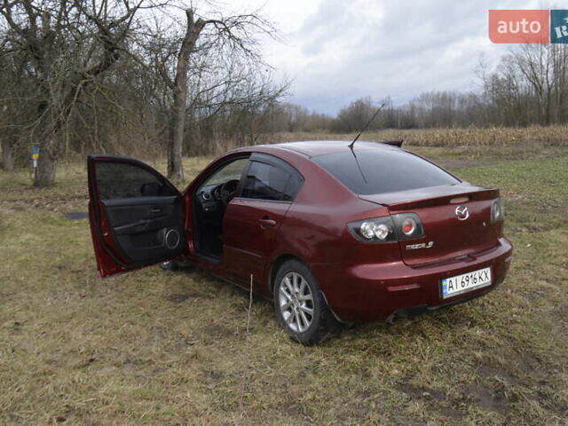 Красный Мазда 3, объемом двигателя 1.6 л и пробегом 247 тыс. км за 5800 $, фото 4 на Automoto.ua