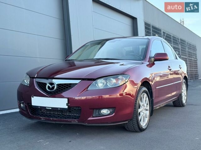 Красный Мазда 3, объемом двигателя 2 л и пробегом 247 тыс. км за 4500 $, фото 1 на Automoto.ua
