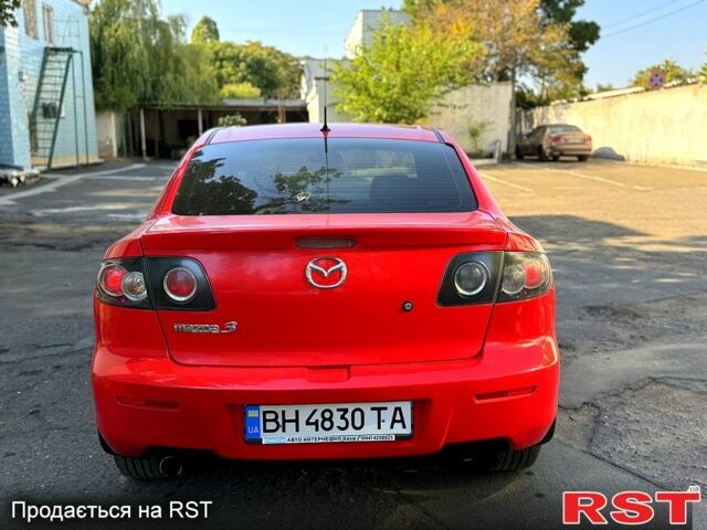 Красный Мазда 3, объемом двигателя 2 л и пробегом 200 тыс. км за 5400 $, фото 2 на Automoto.ua