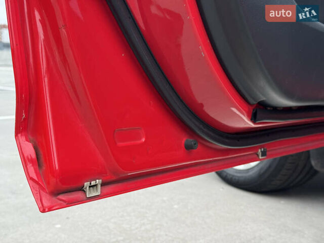 Красный Мазда 3, объемом двигателя 2 л и пробегом 205 тыс. км за 5900 $, фото 64 на Automoto.ua