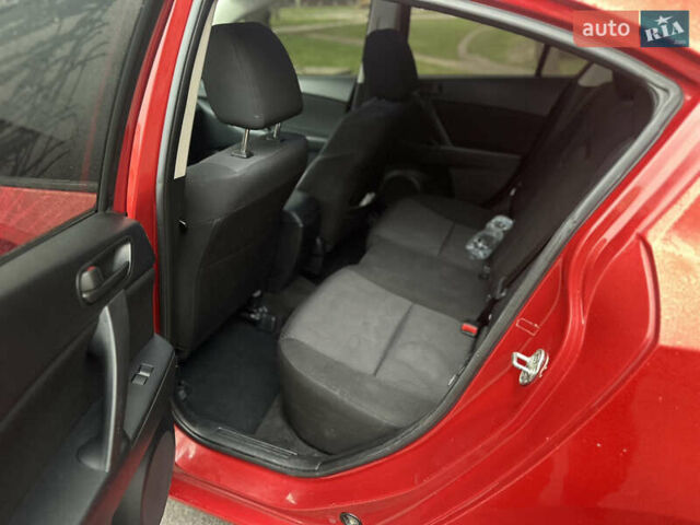 Красный Мазда 3, объемом двигателя 2 л и пробегом 199 тыс. км за 6800 $, фото 22 на Automoto.ua