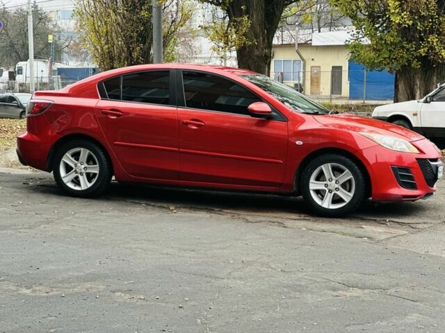 Красный Мазда 3, объемом двигателя 2 л и пробегом 199 тыс. км за 6800 $, фото 2 на Automoto.ua