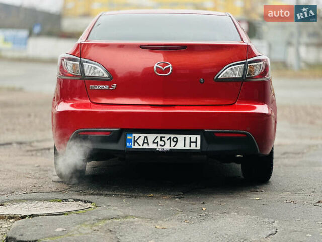 Красный Мазда 3, объемом двигателя 2 л и пробегом 199 тыс. км за 6800 $, фото 7 на Automoto.ua