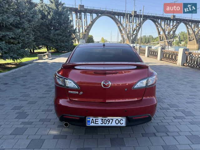 Красный Мазда 3, объемом двигателя 2 л и пробегом 225 тыс. км за 7700 $, фото 4 на Automoto.ua