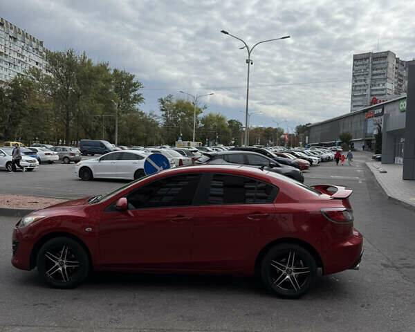 Красный Мазда 3, объемом двигателя 2 л и пробегом 217 тыс. км за 6699 $, фото 7 на Automoto.ua