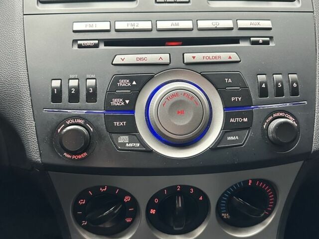 Красный Мазда 3, объемом двигателя 2 л и пробегом 199 тыс. км за 6800 $, фото 14 на Automoto.ua