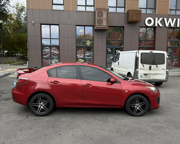 Красный Мазда 3, объемом двигателя 2 л и пробегом 217 тыс. км за 6699 $, фото 3 на Automoto.ua