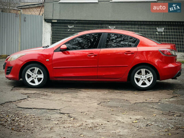 Красный Мазда 3, объемом двигателя 2 л и пробегом 199 тыс. км за 6800 $, фото 5 на Automoto.ua