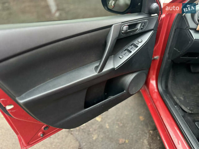 Красный Мазда 3, объемом двигателя 2 л и пробегом 199 тыс. км за 6800 $, фото 9 на Automoto.ua