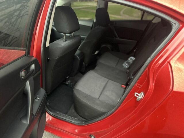 Красный Мазда 3, объемом двигателя 2 л и пробегом 199 тыс. км за 6800 $, фото 18 на Automoto.ua