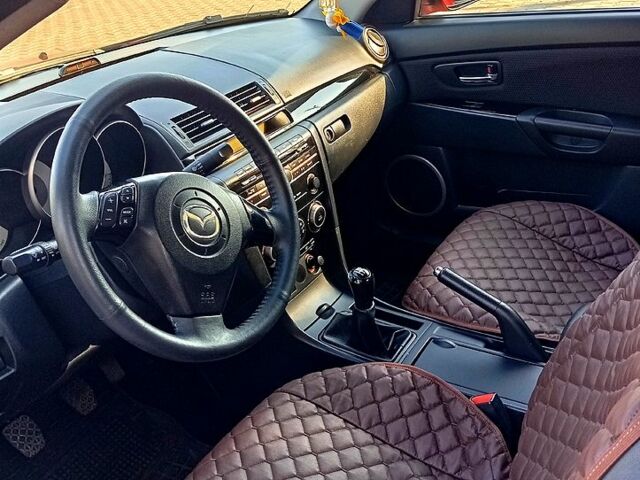 Червоний Мазда 3, об'ємом двигуна 1.6 л та пробігом 185 тис. км за 6250 $, фото 2 на Automoto.ua