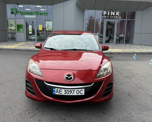 Красный Мазда 3, объемом двигателя 2 л и пробегом 217 тыс. км за 6699 $, фото 1 на Automoto.ua