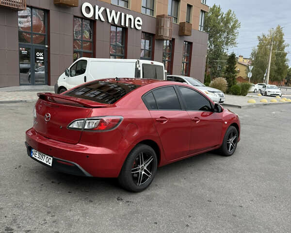 Красный Мазда 3, объемом двигателя 2 л и пробегом 217 тыс. км за 6699 $, фото 4 на Automoto.ua
