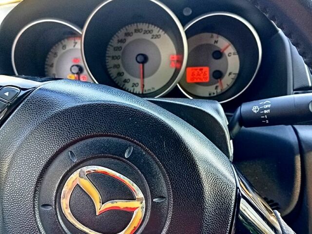Червоний Мазда 3, об'ємом двигуна 1.6 л та пробігом 185 тис. км за 6250 $, фото 1 на Automoto.ua