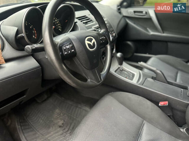 Красный Мазда 3, объемом двигателя 2 л и пробегом 199 тыс. км за 6800 $, фото 14 на Automoto.ua