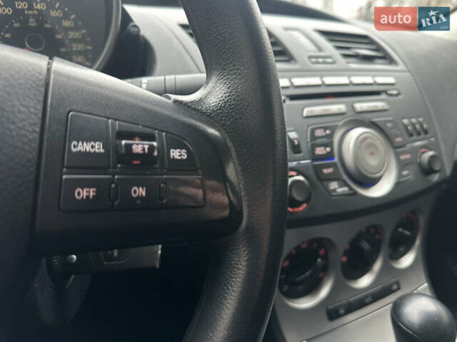 Красный Мазда 3, объемом двигателя 2 л и пробегом 199 тыс. км за 6800 $, фото 12 на Automoto.ua