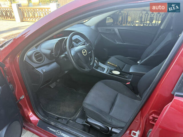 Красный Мазда 3, объемом двигателя 2 л и пробегом 225 тыс. км за 7700 $, фото 6 на Automoto.ua