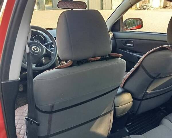 Красный Мазда 3, объемом двигателя 1.6 л и пробегом 185 тыс. км за 5500 $, фото 8 на Automoto.ua