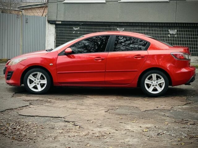 Красный Мазда 3, объемом двигателя 2 л и пробегом 199 тыс. км за 6800 $, фото 5 на Automoto.ua