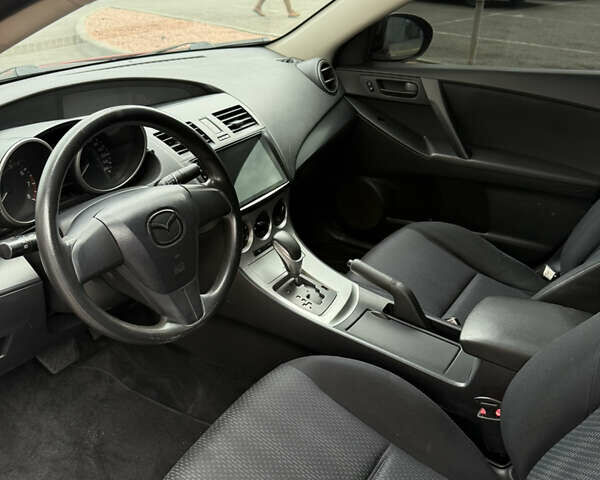 Красный Мазда 3, объемом двигателя 2 л и пробегом 217 тыс. км за 6699 $, фото 8 на Automoto.ua