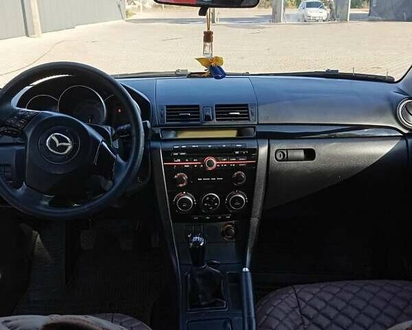 Красный Мазда 3, объемом двигателя 1.6 л и пробегом 185 тыс. км за 5500 $, фото 5 на Automoto.ua