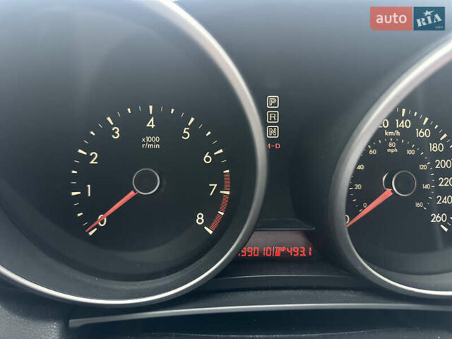 Красный Мазда 3, объемом двигателя 2 л и пробегом 199 тыс. км за 6800 $, фото 11 на Automoto.ua