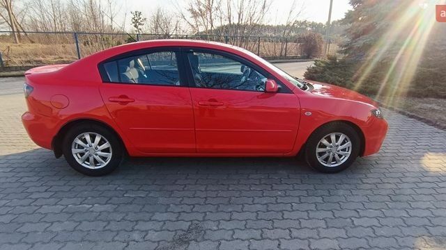 Красный Мазда 3, объемом двигателя 1.6 л и пробегом 179 тыс. км за 5800 $, фото 6 на Automoto.ua
