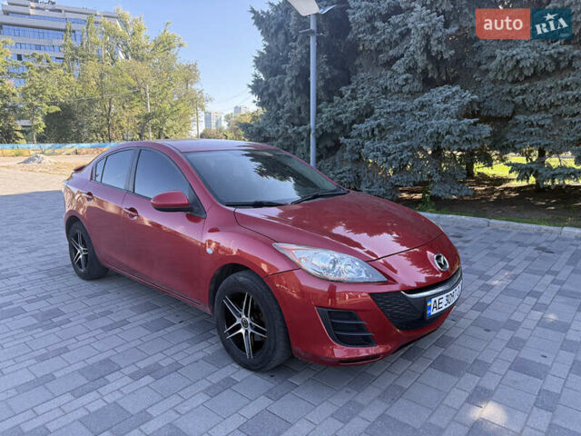 Красный Мазда 3, объемом двигателя 2 л и пробегом 225 тыс. км за 7700 $, фото 2 на Automoto.ua