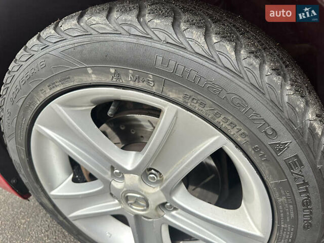 Красный Мазда 3, объемом двигателя 2 л и пробегом 199 тыс. км за 6800 $, фото 19 на Automoto.ua