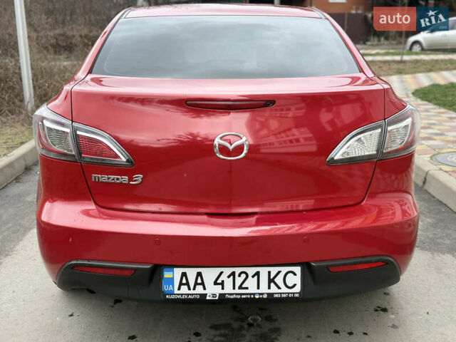 Червоний Мазда 3, об'ємом двигуна 1.6 л та пробігом 170 тис. км за 7999 $, фото 4 на Automoto.ua