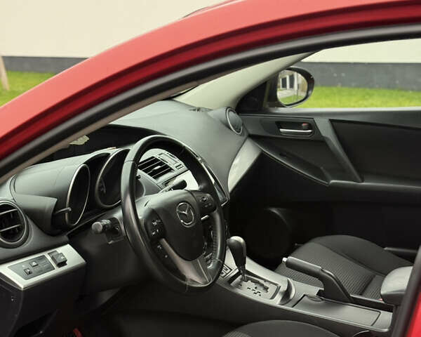 Червоний Мазда 3, об'ємом двигуна 1.6 л та пробігом 212 тис. км за 7800 $, фото 10 на Automoto.ua