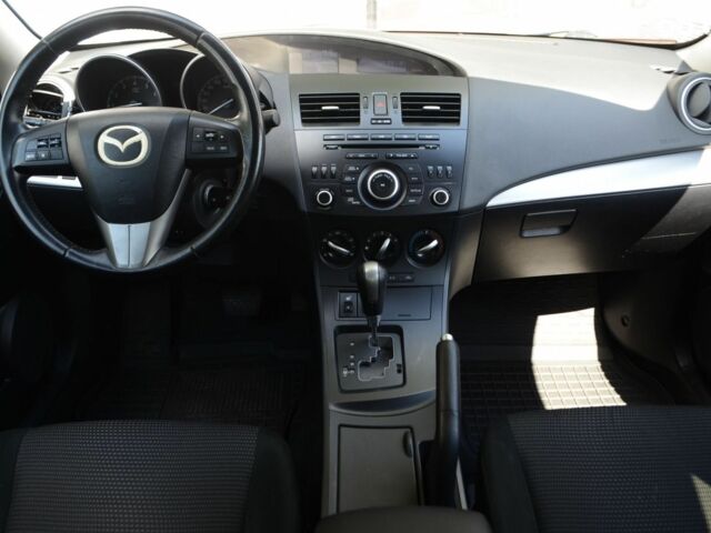 Червоний Мазда 3, об'ємом двигуна 1.6 л та пробігом 140 тис. км за 8700 $, фото 9 на Automoto.ua